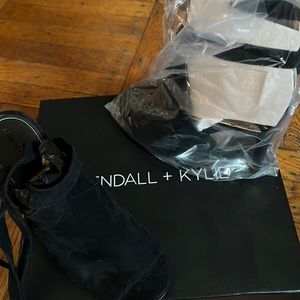 Brand New Kendall Kyle Black open toe shoes.   Tie at ankle. Size 7M.